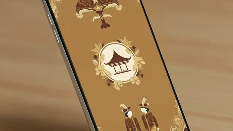 Tangan memegang smartphone dengan desain undangan digital khitanan yang elegan